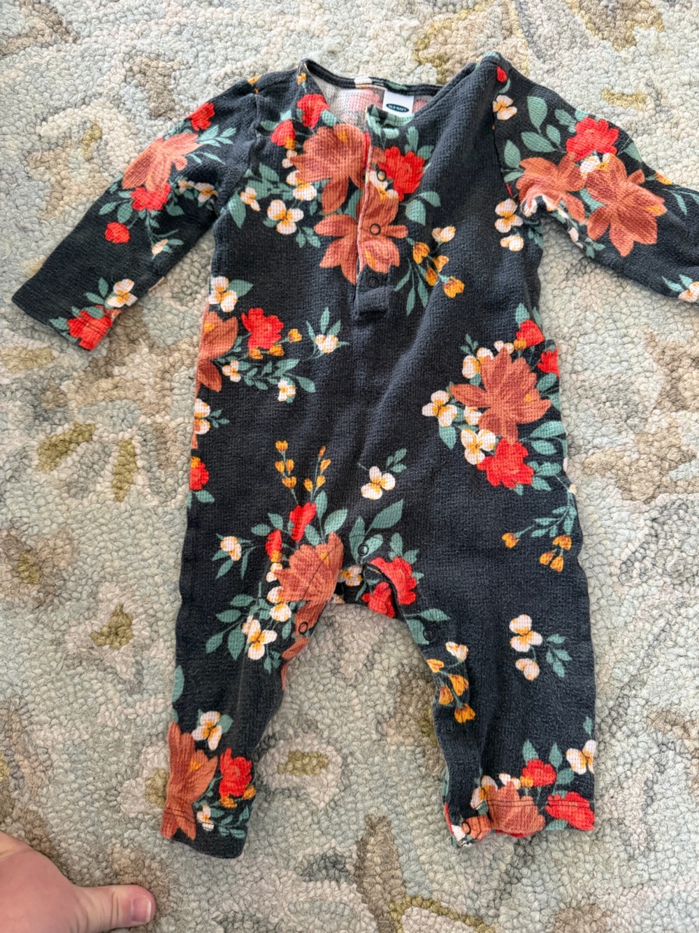 Black Floral One-Piece Romper with Rust and Red Blooms